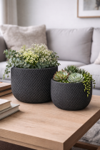 Textured planters with floral arrangement