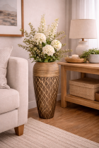 Decorative corner with greenery and art