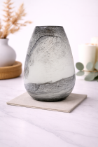 Elegant marbled glass vase on marble