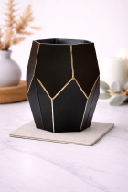 Modern black geometric vase on marble