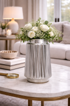 Elegant living room with silver vase