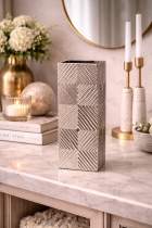 Elegant silver vase and decor scene