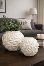 Geometric vases on a wooden table