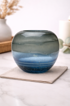 Elegant gradient glass vase on marble