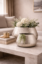 Elegant planters on marble coffee table