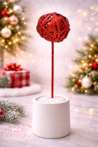 Glittery red decor in festive vase