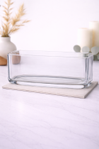 Clear glass vase on marble counter