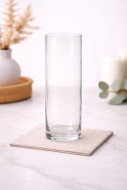 Clear glass vase on marble countertop