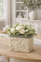Floral centerpiece on a wooden table