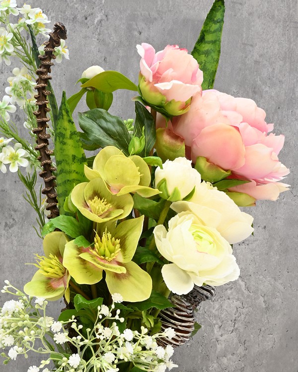 Black swirl glass vase with Peonies, Ranunculus and Hellebores