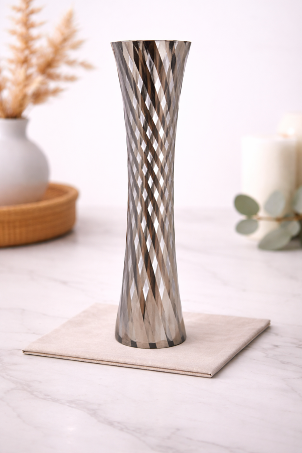 Elegant mirrored vase on marble countertop