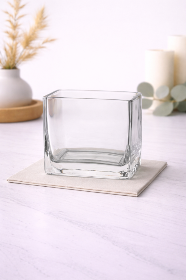 Square glass vase on marble countertop