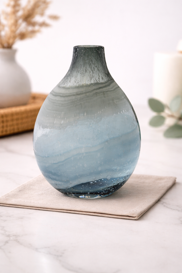 Elegant glass vase on marble counter
