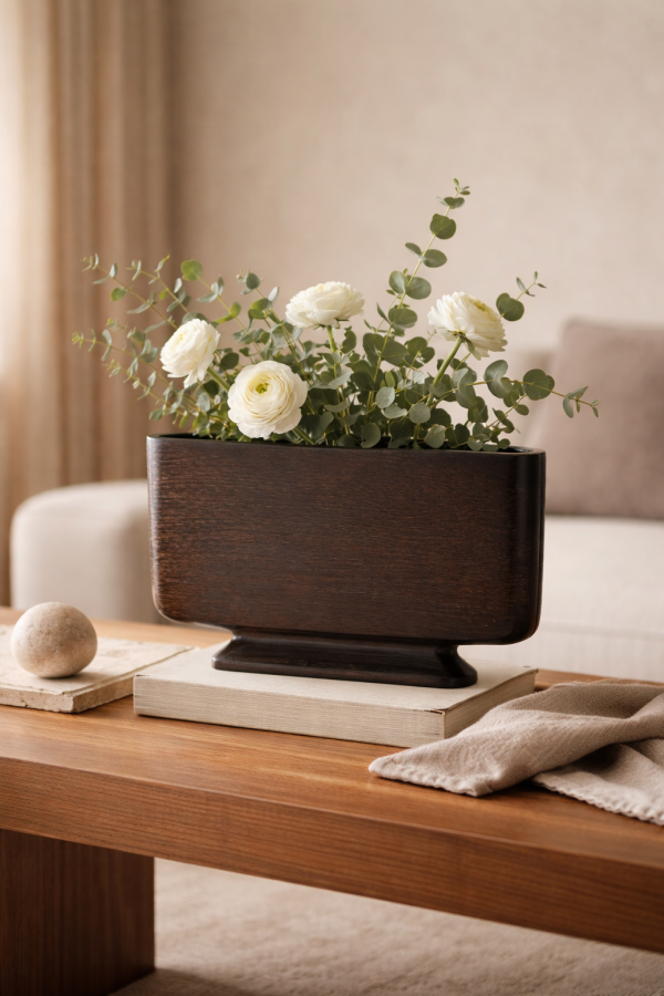Minimalist planter with ranunculus and eucalyptus